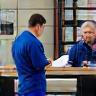 Transparent pricing – mechanic explaining costs to customer