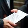 Warranty paperwork and handshake at Advance Transmissions